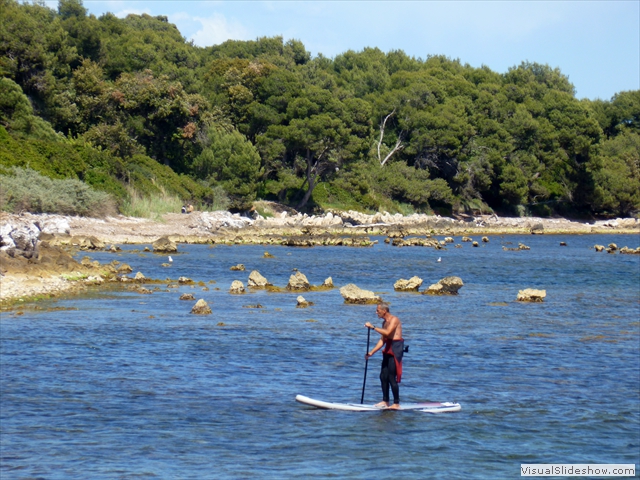 monk paddleboarding